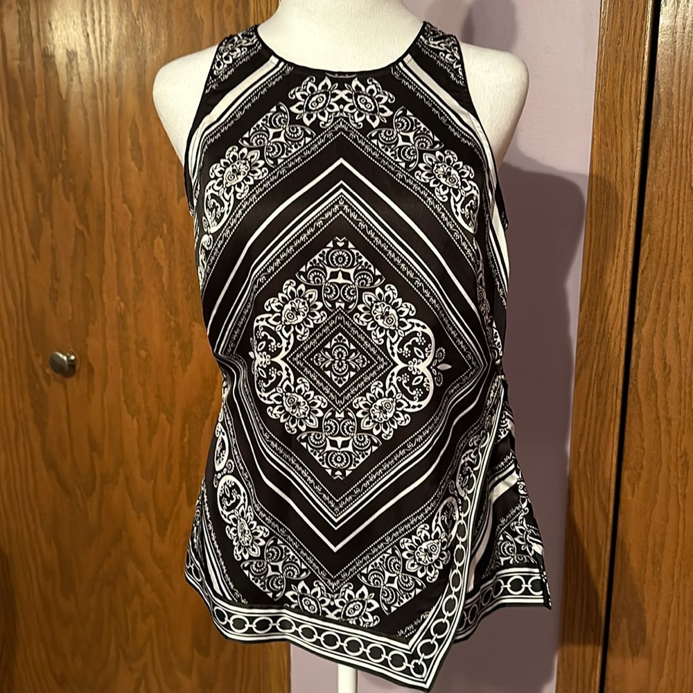 Set of two White House Black Market tops size small.